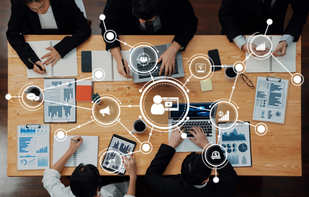 depositphotos 837732970 xl Team of Rise Marketing working together and collaborating for a project